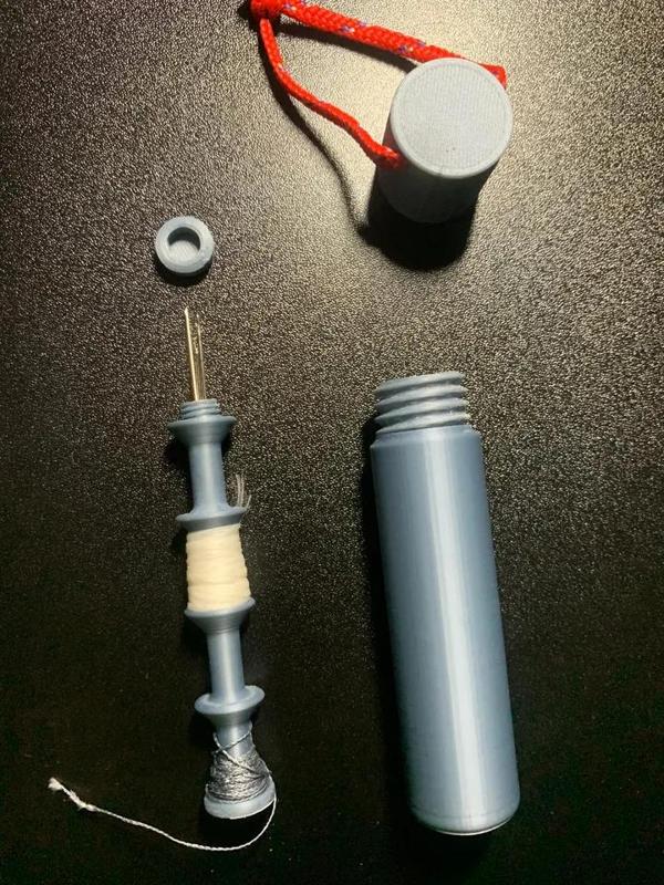 Portable Sewing kit with lanyard hole   