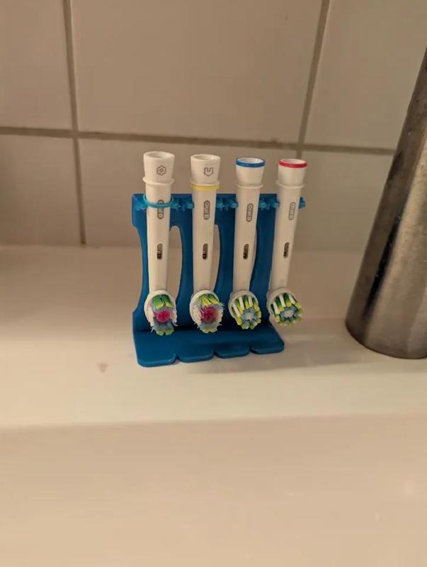 Oral-B electric toothbrush head stand.   