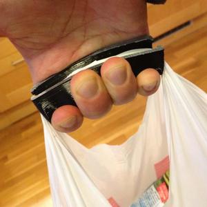 Flexible Plastic Bag Handle with "coins"