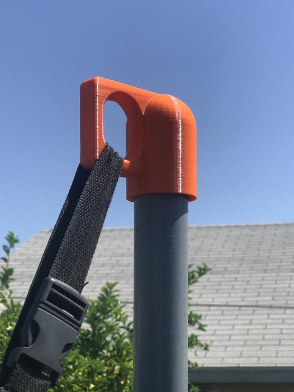 Trampoline net holder