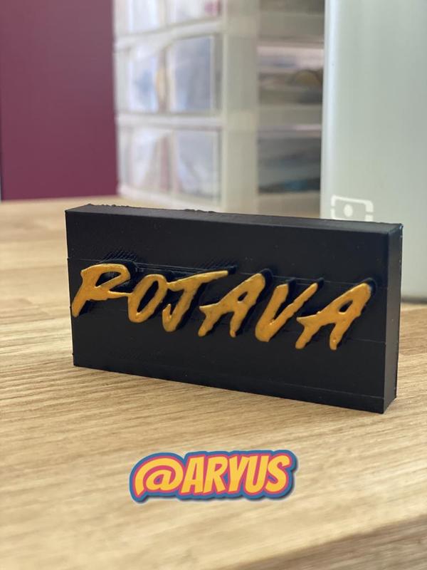 Bloc with Rojava writing by Arya JEMO