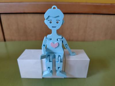 Flexi toy boy doll keychain