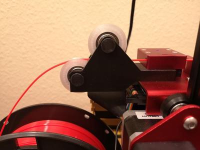 Filament roller guide