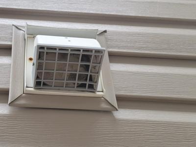 Outdoor vent cover with critter guard