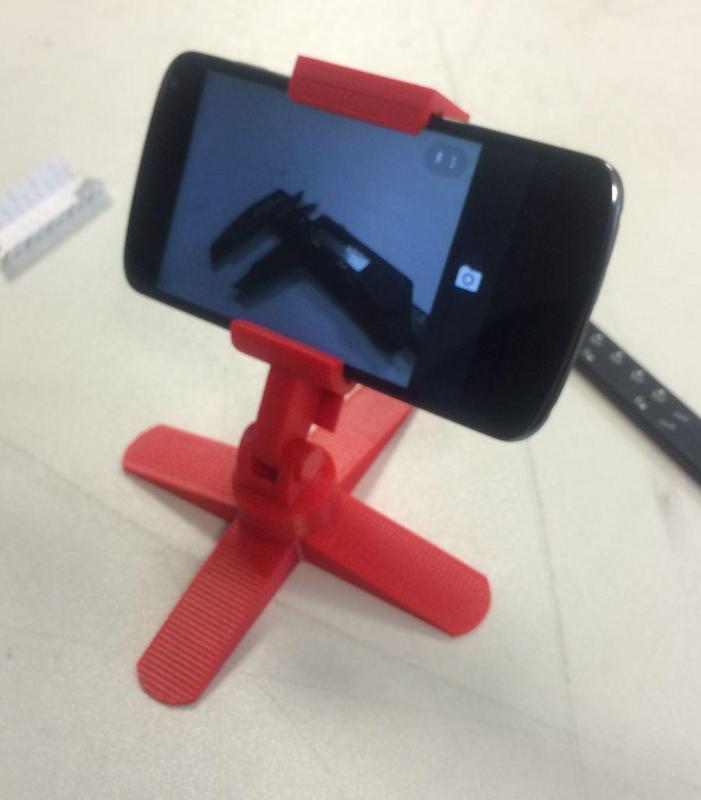 Quadropod camera phone stand