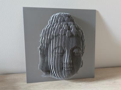 Buda layered sculpture