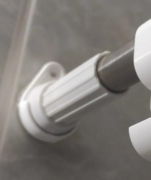 Shower curtain rod fixation