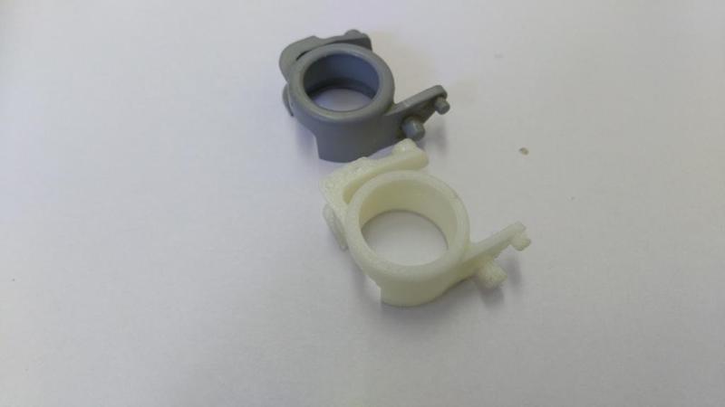 Headlight washer bracket