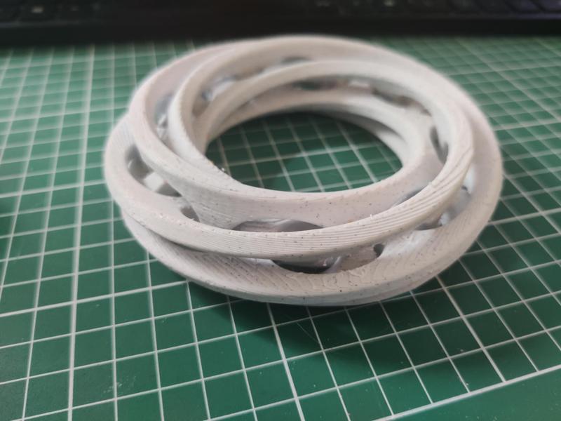 Triple Interlocking Mobius Rings