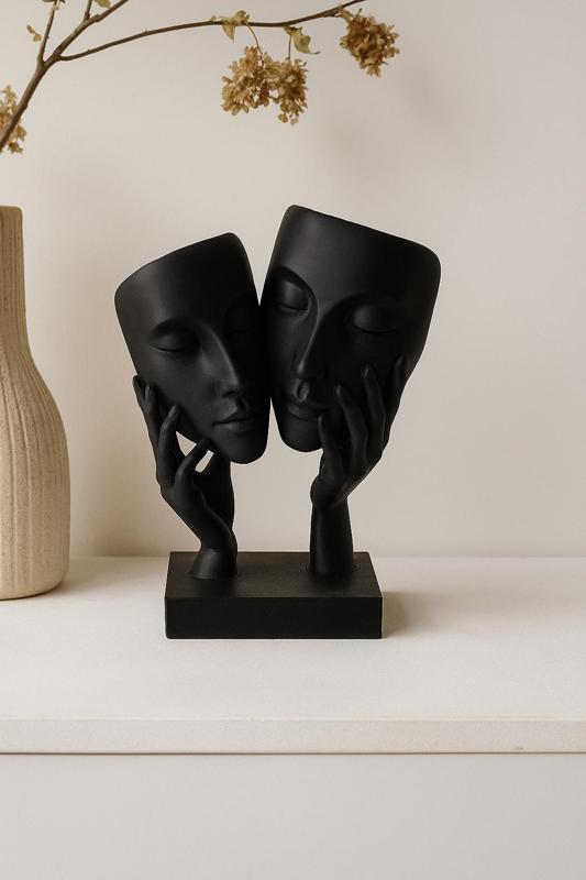 Two Faces One Soul – Abstract Black Sculpture of Masked Faces in Hands