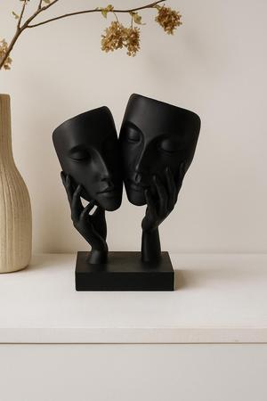 Two Faces One Soul – Abstract Black Sculpture of Masked Faces in Hands
