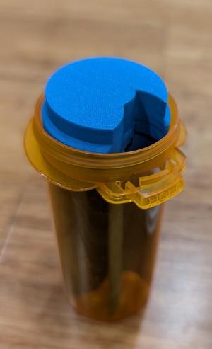 pill bottle (push tab vial with reversible cap 16 DRAM) ratcheting separator / divider / organizer