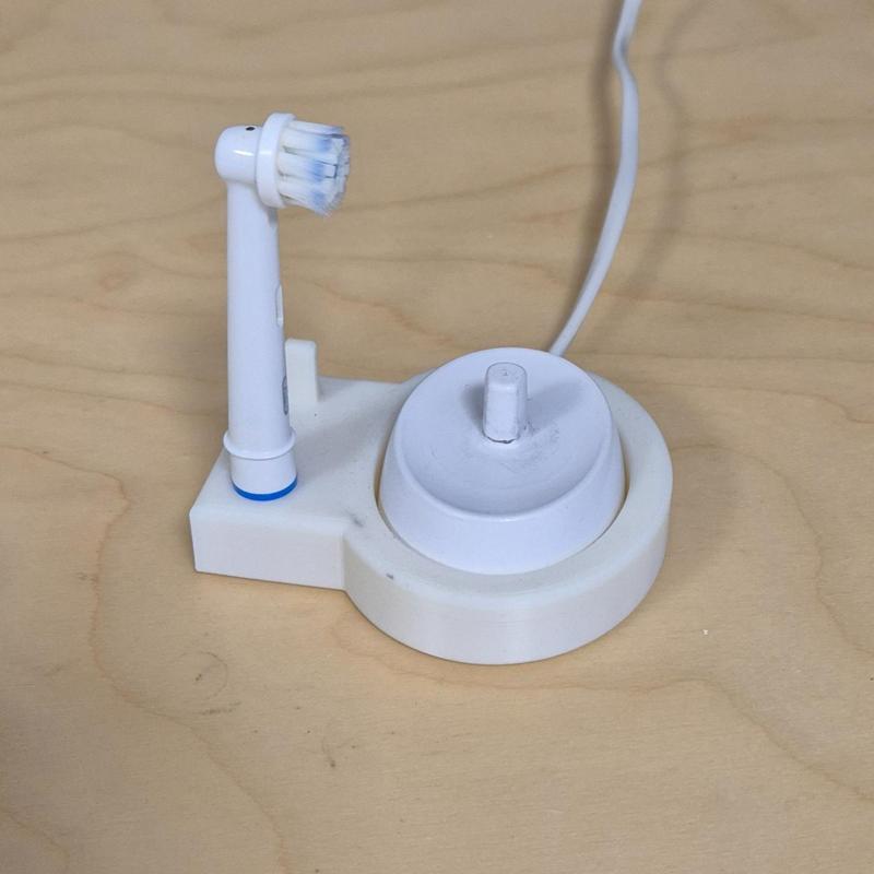 Porta spazzolino elettrico con base di ricarica