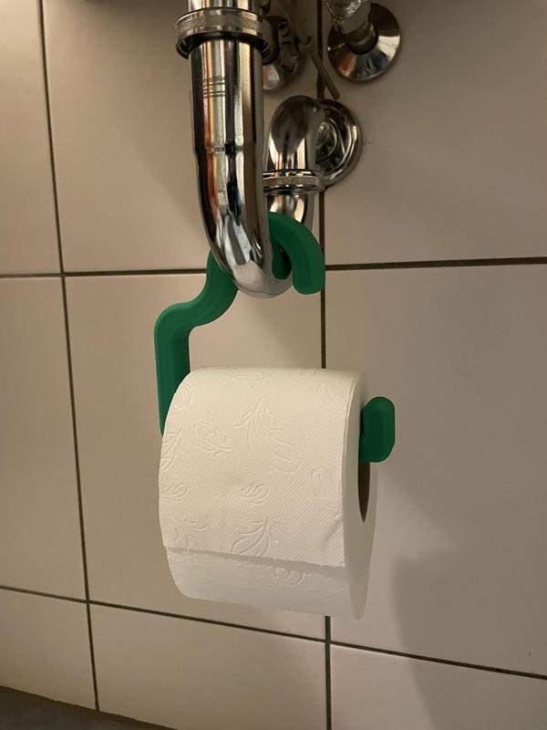 Toilet roll holder for faucet drain pipe