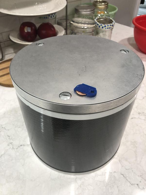 Penny Holder to be used to help open Bearikade Bear Canister