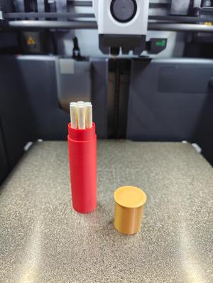 Thin cigarette storage box with shotgun shape