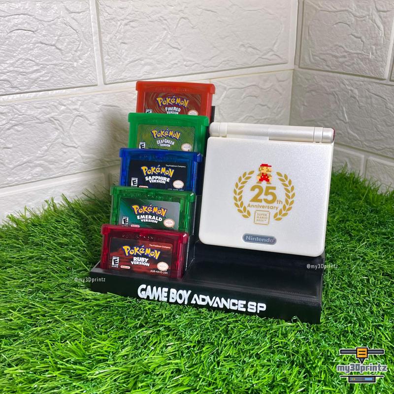 GAMEBOY ADVANCE SP STAND WITH 5X GAME CARTRIDGES HOLDER