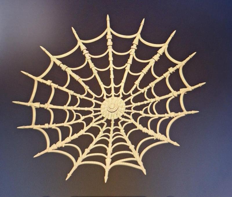 Cup-shaped spider web