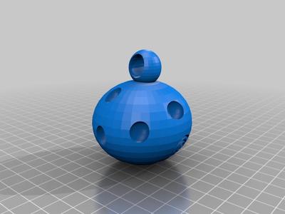 Hanging sphere with holes and swirls