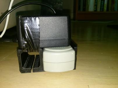 Support for a wall-wart that sticks out from a power bar