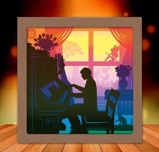 man playing piano lightbox