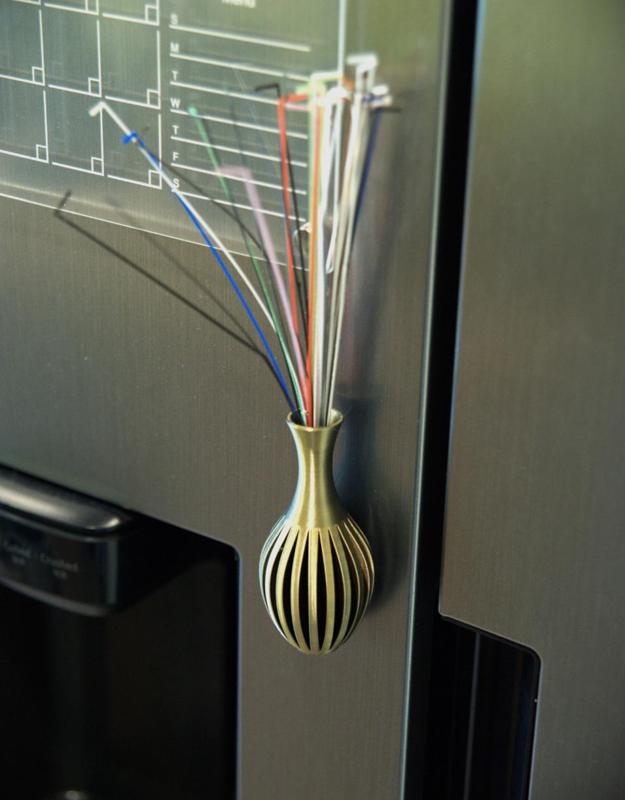 Magnetic flower pot on the fridge