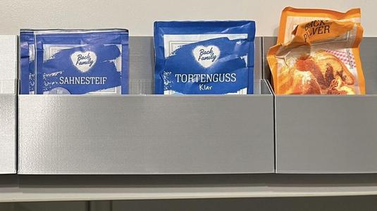 Pouch holder wall mount (e.g. baking powder)