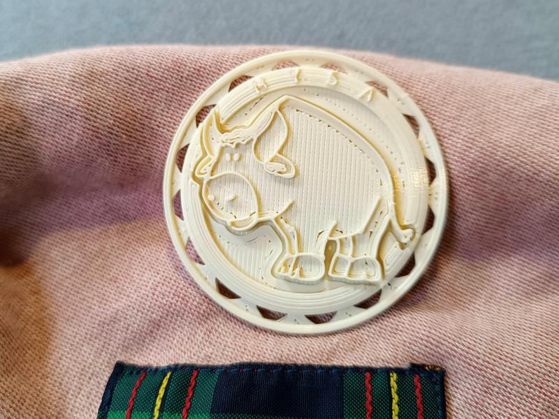 Scout patch badge of Mysa, the Jungle's buffalo, ready to be sewn on