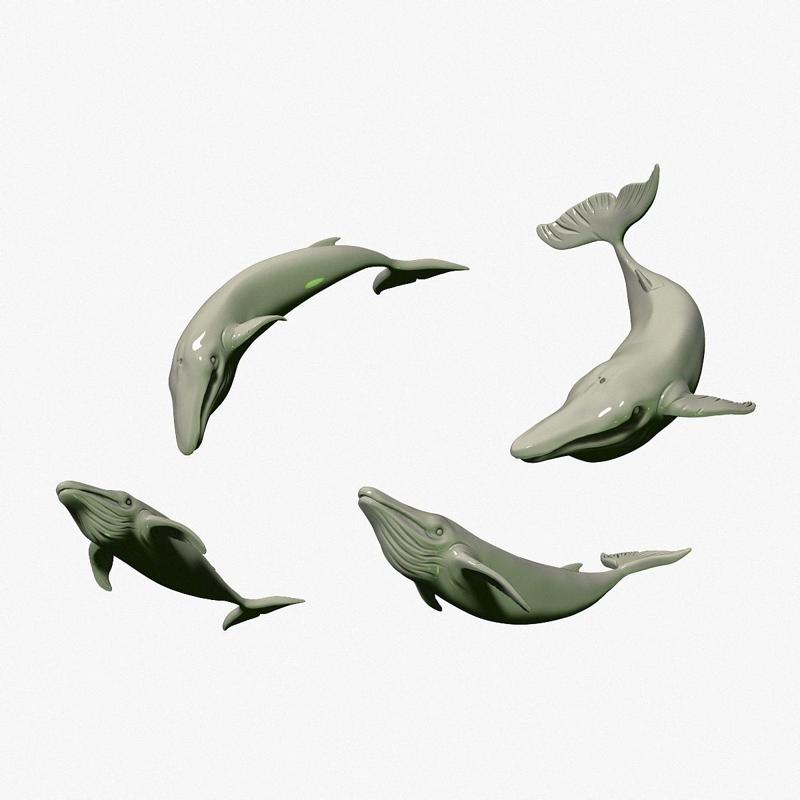 four whales in different positions. toy