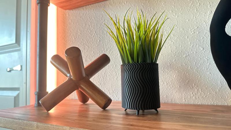 Modern Planter with Legs and Curved Lines