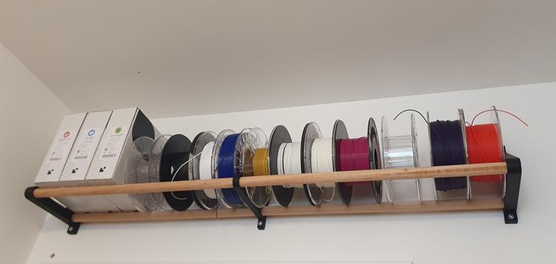 Filament roll wall holder