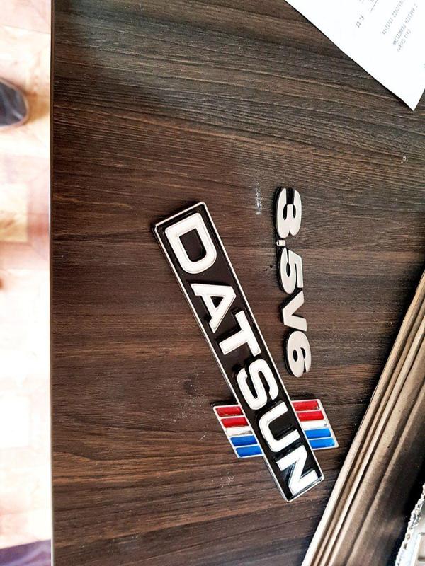 Datsun Emblem Car
