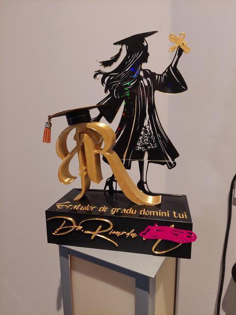 Promotional statue female letter R