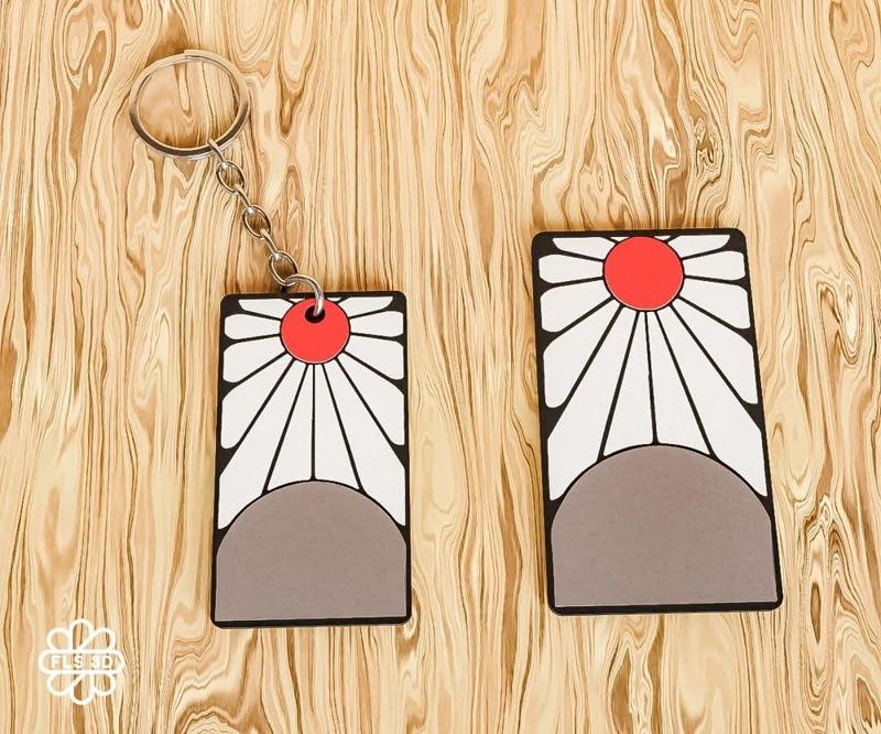 Demon Slayer Keychain & Magnet – Rising Sun Design
