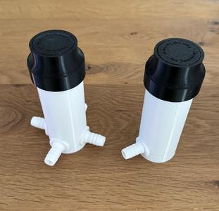 Pop up sprinkler with hose connector