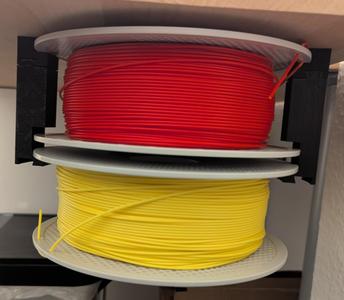 Spool bracket under table