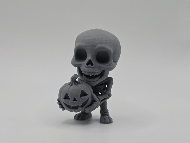 Happy Skeleton with Pumpkin Figurine/Keychain