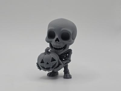 Happy Skeleton with Pumpkin Figurine/Keychain