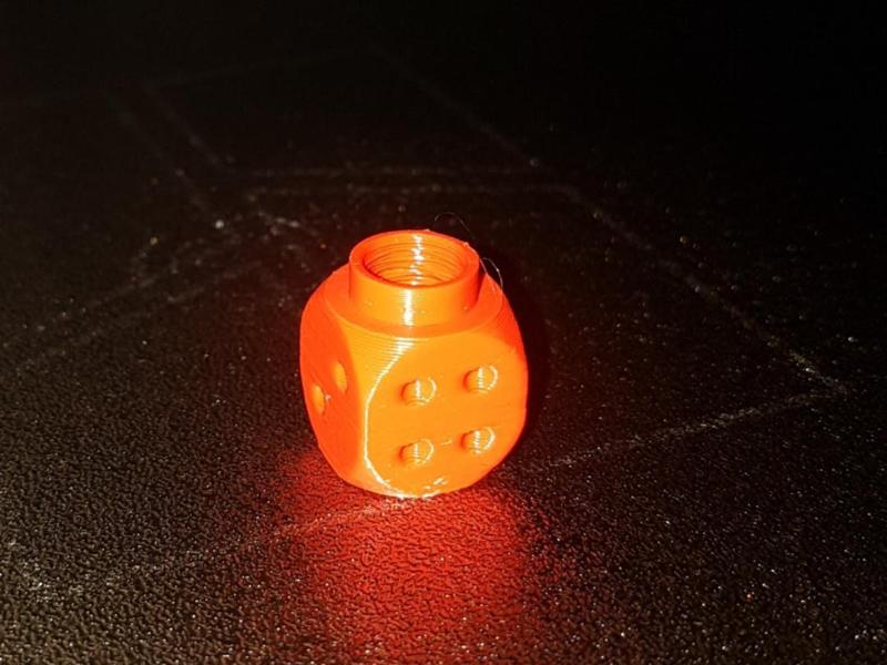 Dice valve cap