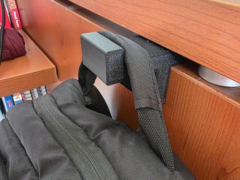 Ultra high strength bagpack hanger