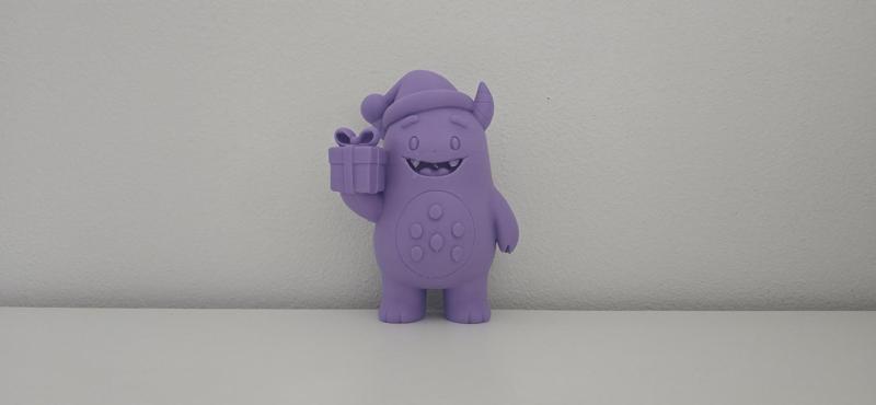 Cute Monster with Santa Hat and Gift Christmas