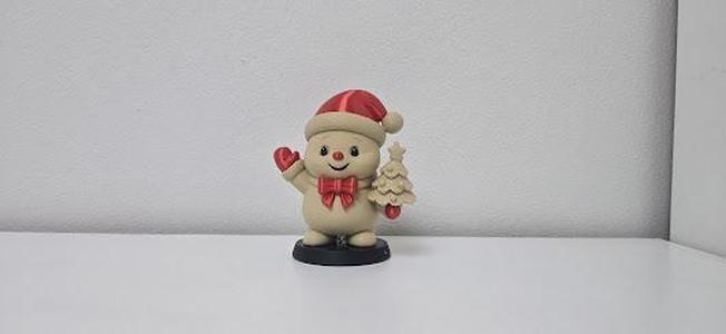 Waving Snowman with Santa Hat and Mini Tree