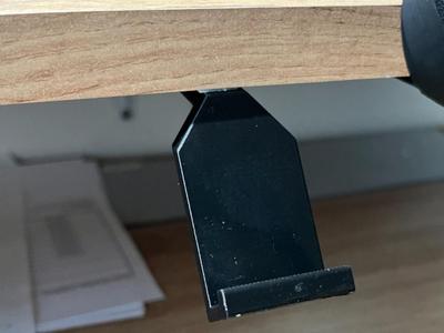 Under the desk phone stand