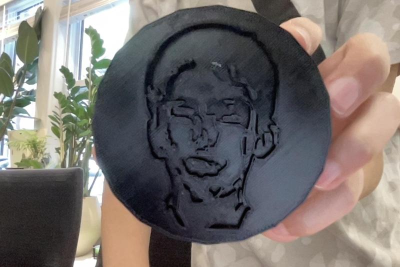 Hockey Puck with a face on it