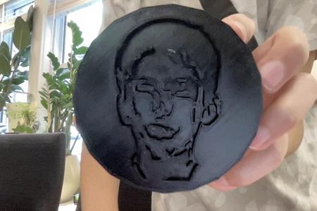 Hockey Puck with a face on it