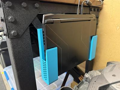 Laptop desk side mounts