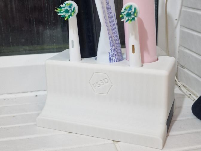 Toothbrush and toothpaste stand with drip tray 