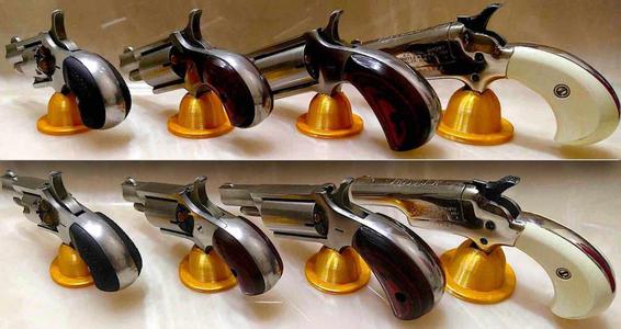 Simple display stand for NAA and Colt Butler pistols