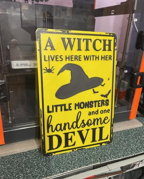 A Witch lives here Sign