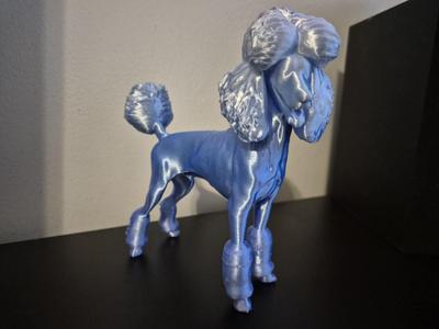 Poodle dog figurine
